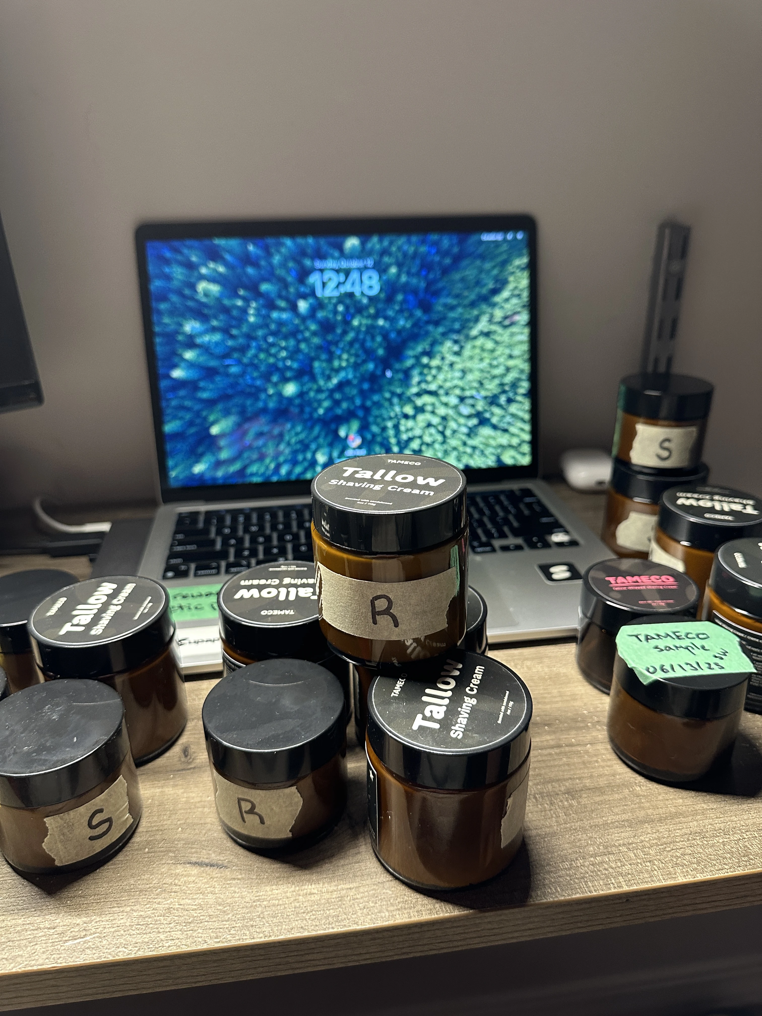 Test batches of Tameco tallow shaving cream lined up during product development