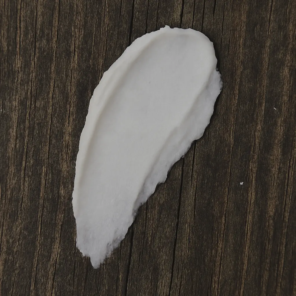 Cream smear on wood, texture detail